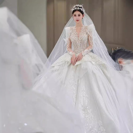 Luxury Long Sleeve Ball Gown Wedding Dress with Lace Appliqué & Cathedral Train