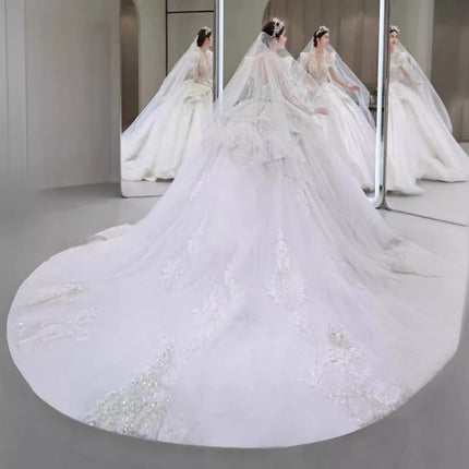 Luxury Long Sleeve Ball Gown Wedding Dress with Lace Appliqué & Cathedral Train